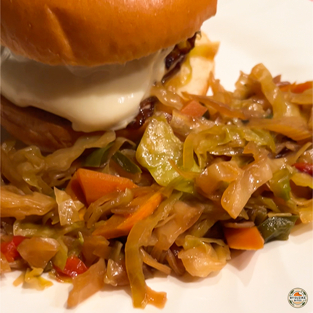 Homemade double cheeseburger with sautéed vegetables