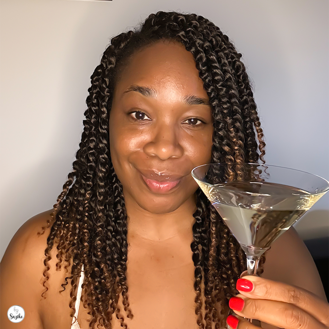 Me Time | The Fantasy vs. The Man 3 A woman drinking a martini while watching Mad Max: Fury Road, reflecting on a disappointing relationship.