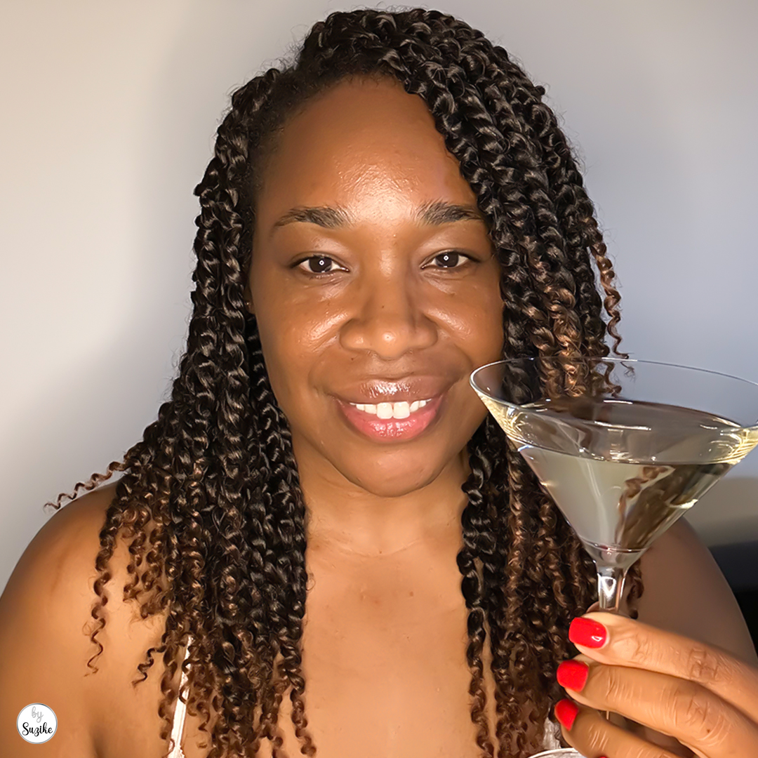 Me Time | The Fantasy vs. The Man 4 A woman drinking a martini while watching Mad Max: Fury Road, reflecting on a disappointing relationship.