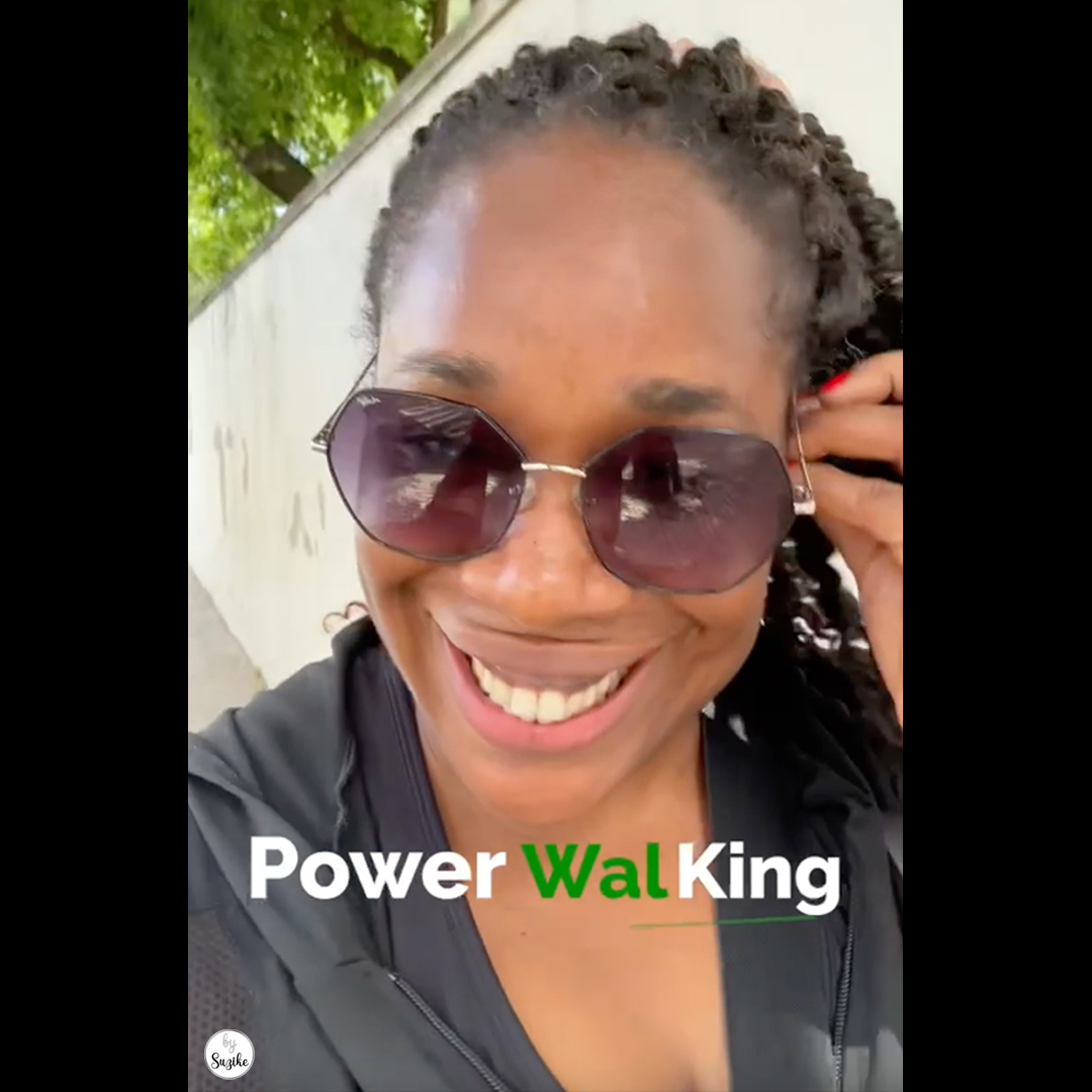 Woman smiling during outdoor power walk, casual vlog moment