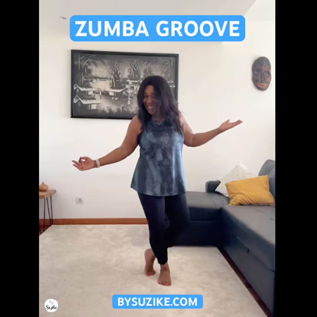 Woman doing a zumba groove workout at home, inspired by Diana Saldanha