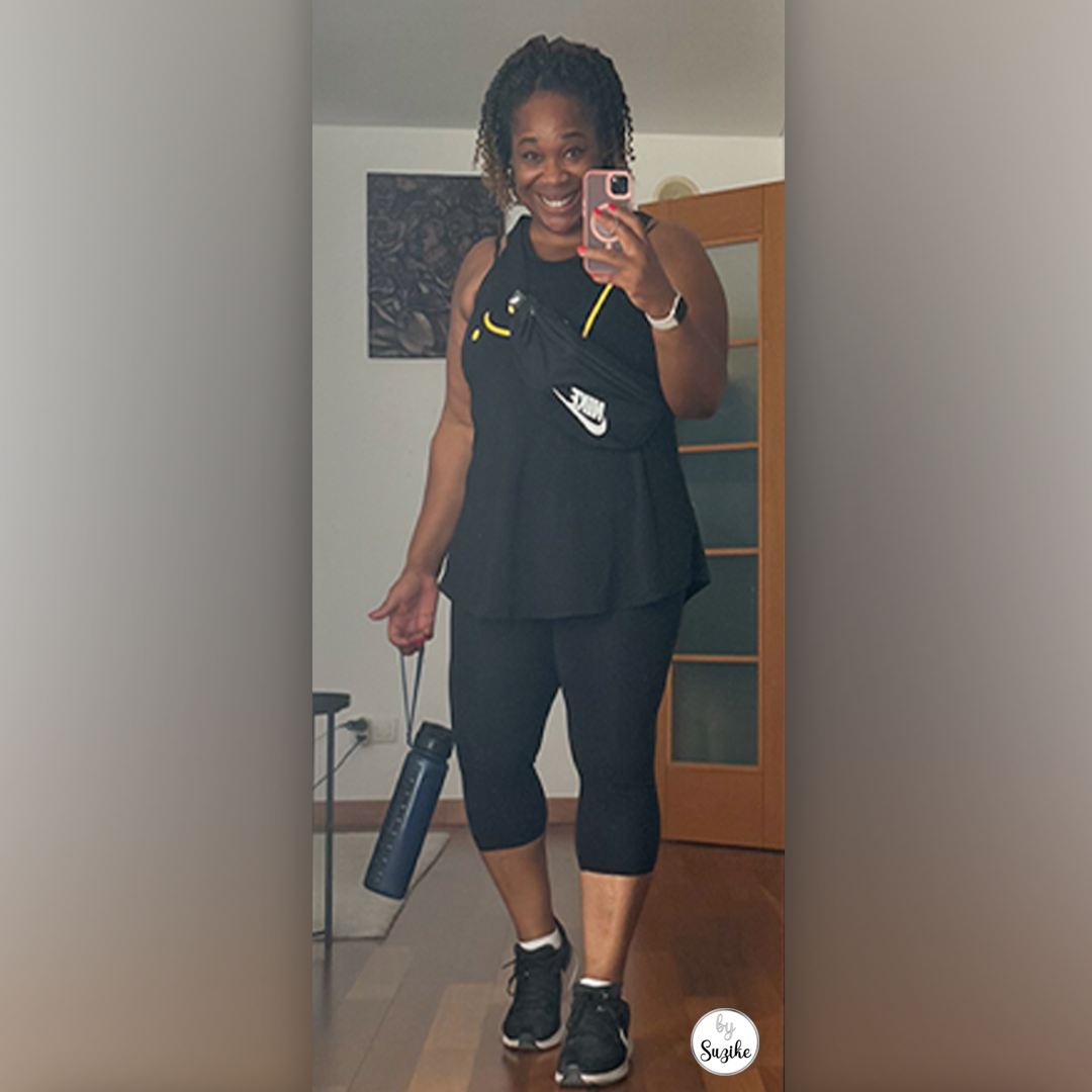 Woman in black activewear holding a water bottle for a simple outdoor workout thumbnail