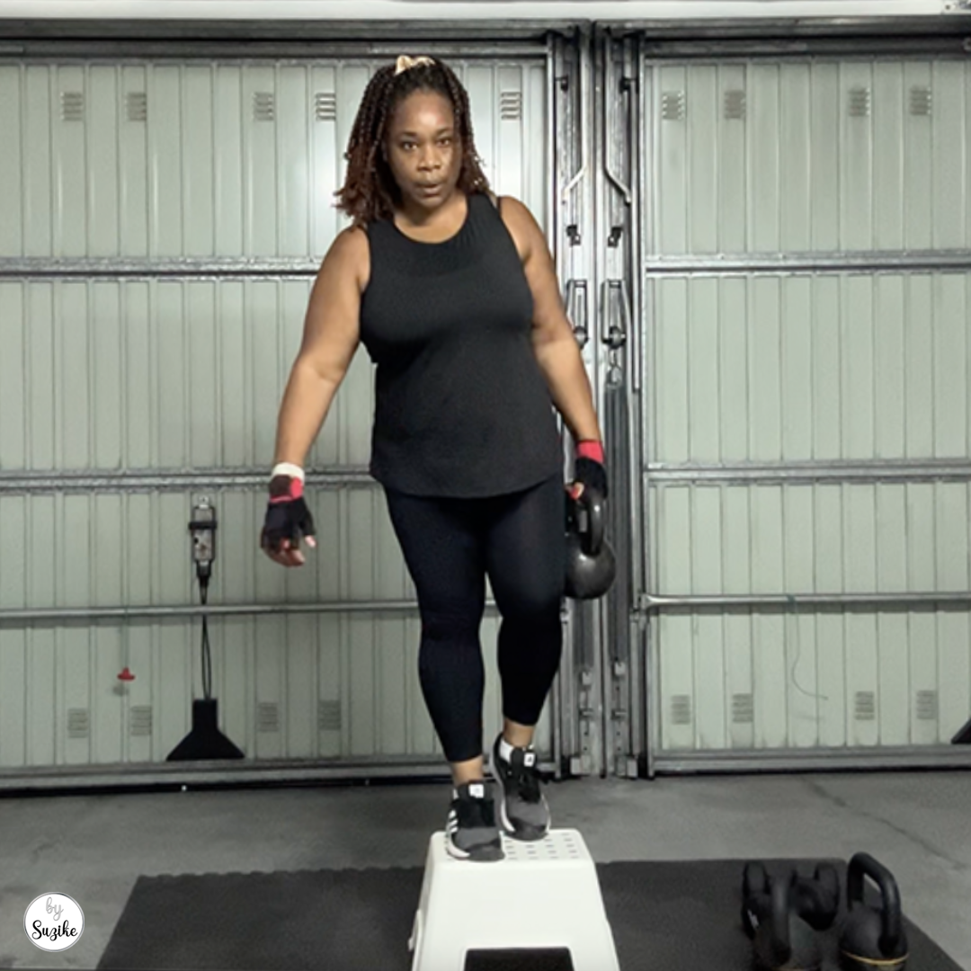 Woman doing a 25-minute kettlebell leg workout at home for lower-body strength and stability