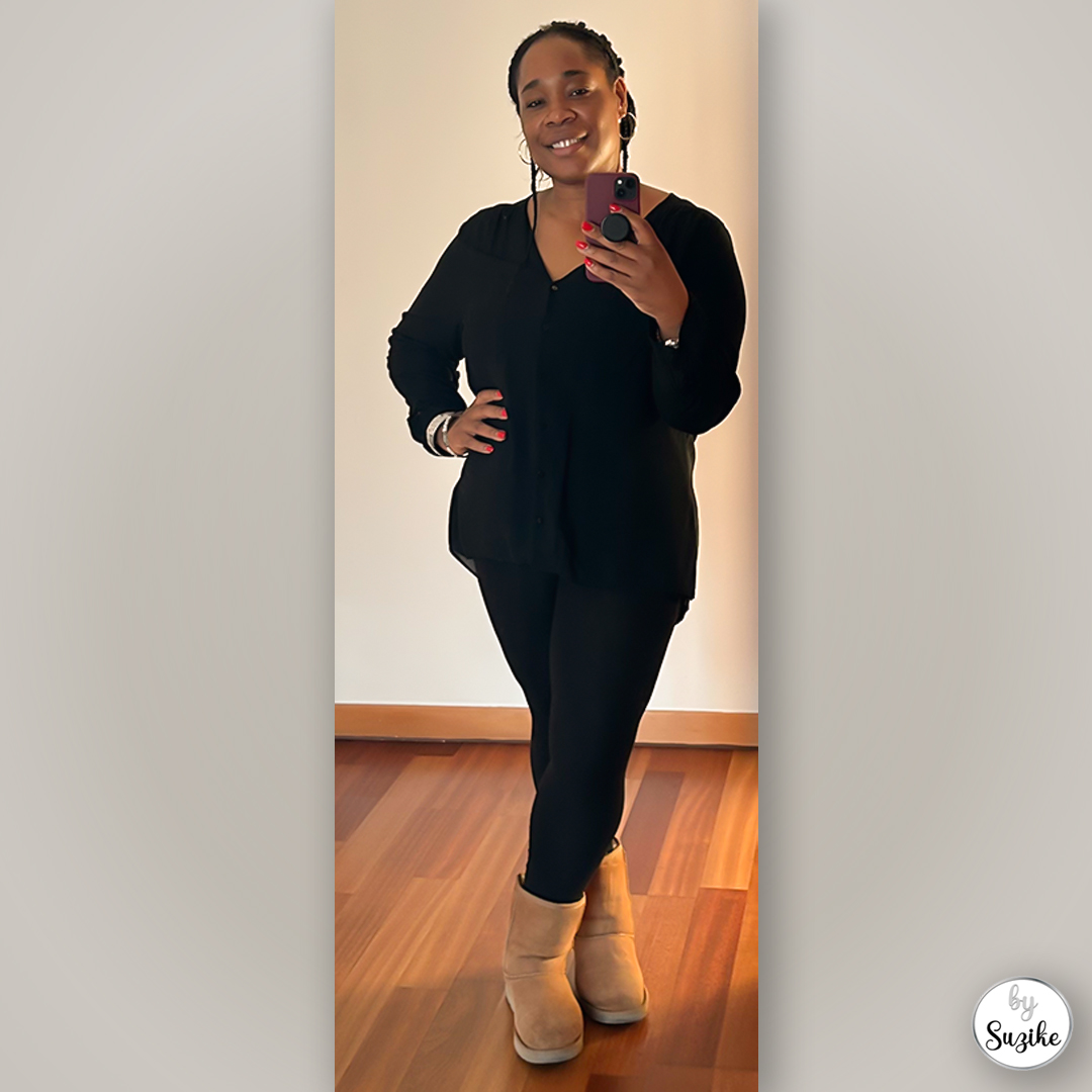 Everyday casual chic look with black top, leggings and beige winter boots.