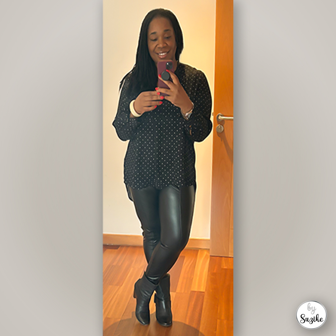 Suzike wearing a black top, leather leggings and Fly London boots, real-life winter outfit mirror photo