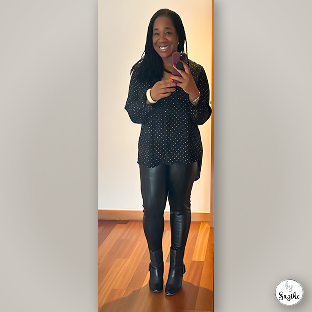 Suzike posing in black top, leather leggings and Fly London boots, everyday winter outfit inspiration