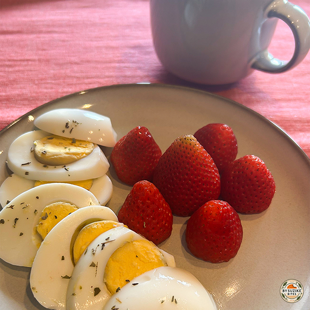 low carb eggs and strawberries breakfast served with coffee