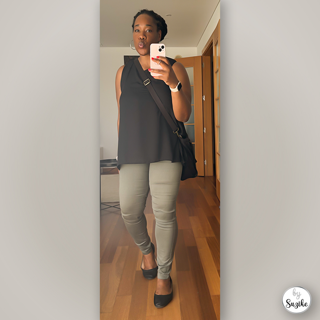 Black sleeveless top with green pants mirror selfie, everyday outfit