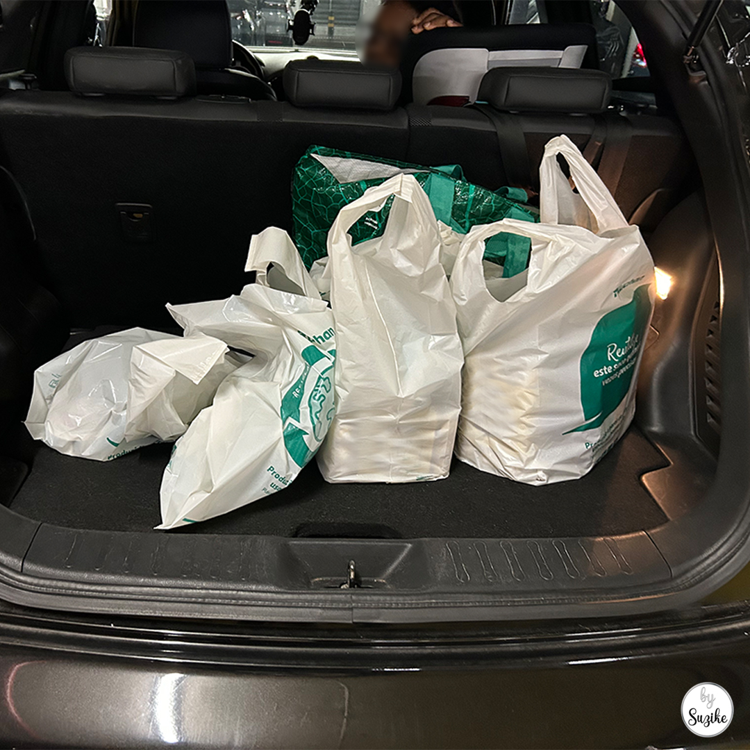grocery bags placed in the trunk after online pickup at Auchan
