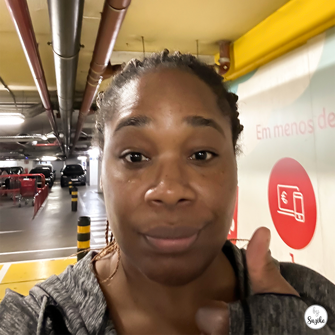 mother taking a selfie inside the car before grocery pickup