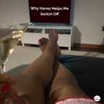 Best horror movies for women to watch alone: Woman watching a movie alone at home during a relaxing evening, best horror movies for women to watch alone