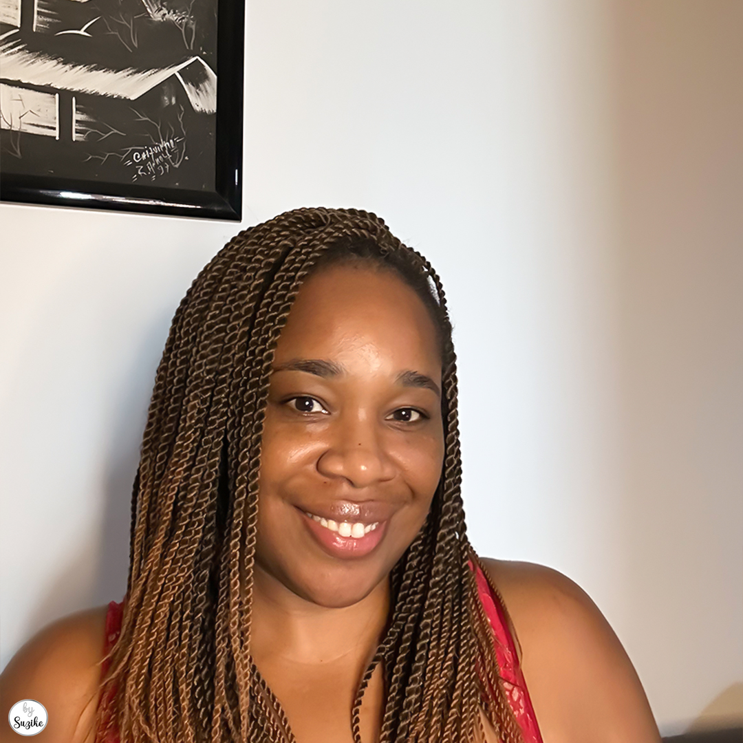 Woman holding a mug and looking at the camera during a quiet reflection moment