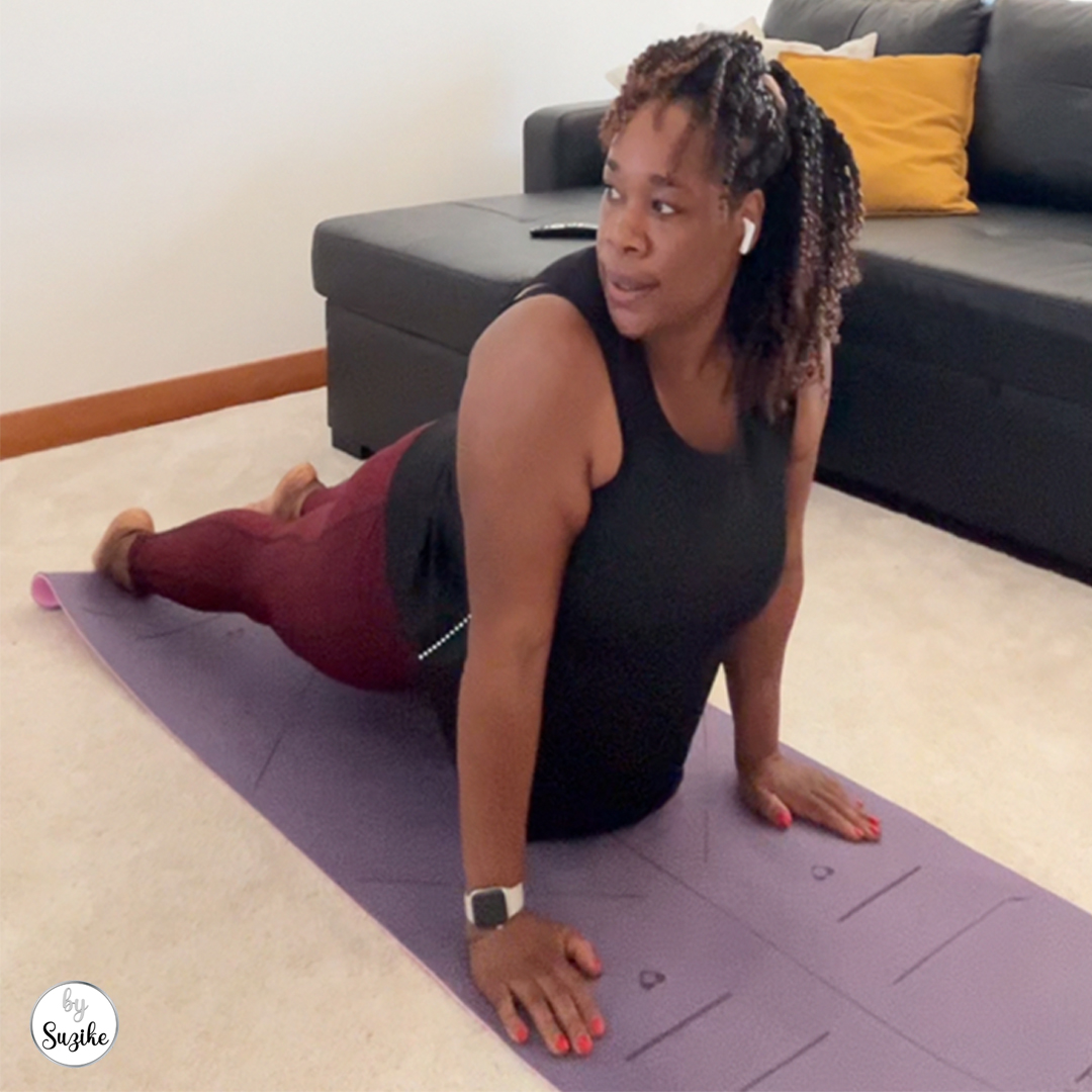 Body Balance Review upward dog pose during the stretch sequence, showing flexibility and core engagement