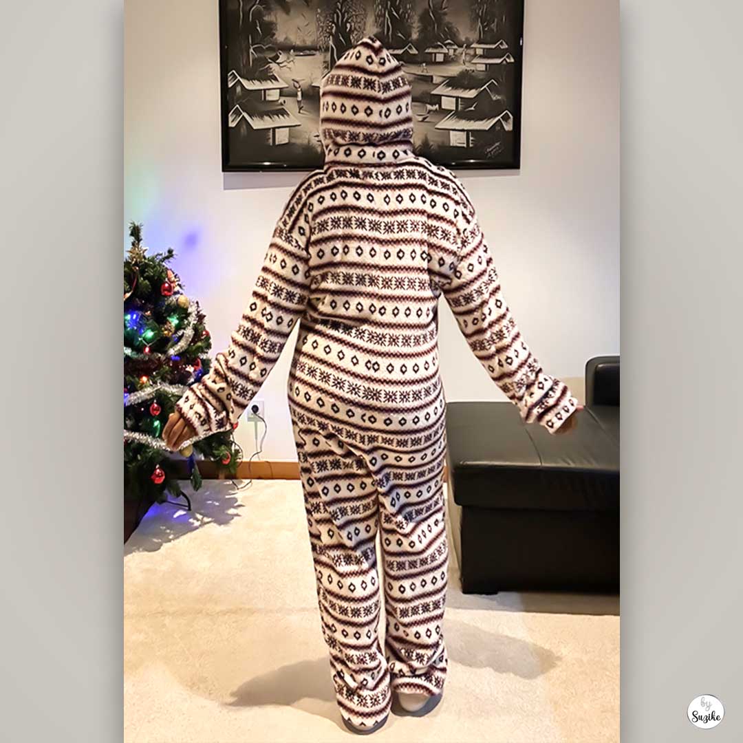 Hooded back view of a Fair Isle pyjama jumpsuit highlighting warm and comfortable winter loungewear at home.
