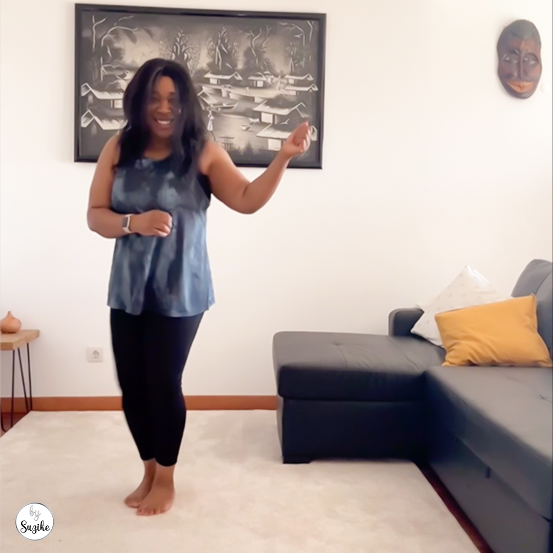 Zumba class review showing a joyful dance moment during an at home Zumba session