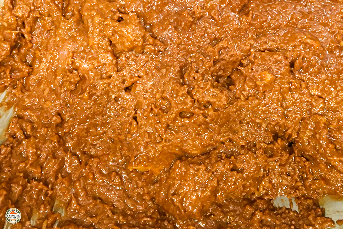 Keto no bake cookie mixture spread in a tray to set