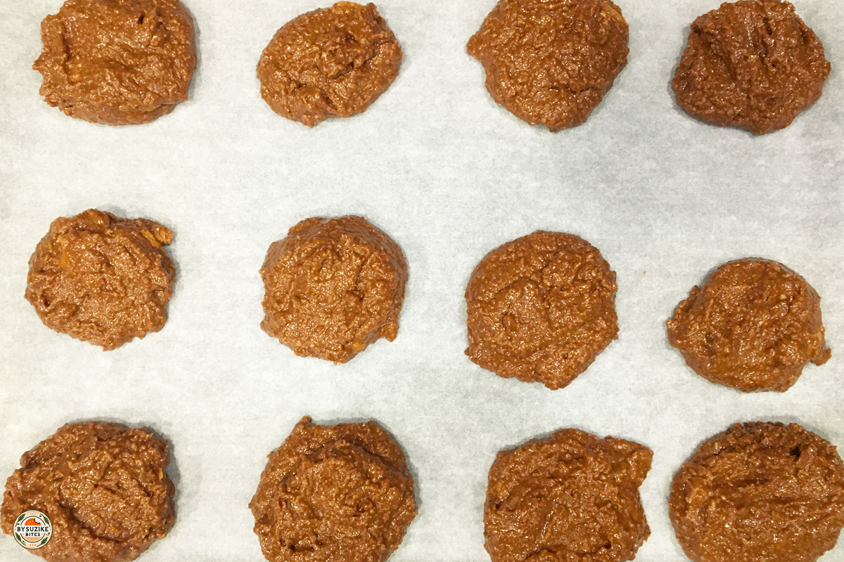 Scooped keto no bake cookies on parchment paper ready to chill