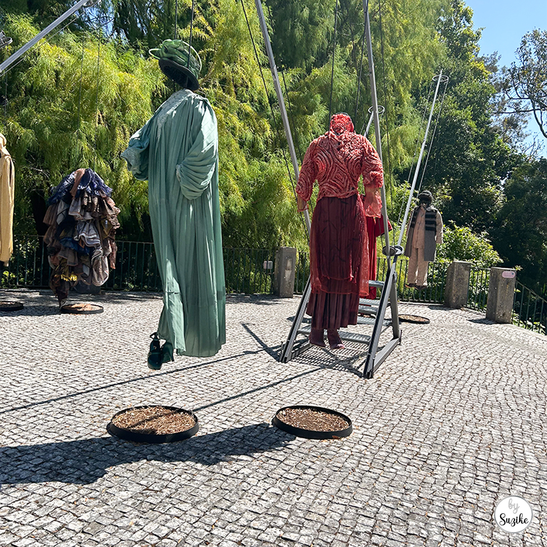 Outdoor display figures in the courtyard area at Monteiro-Mor Park and Theatre Museum.