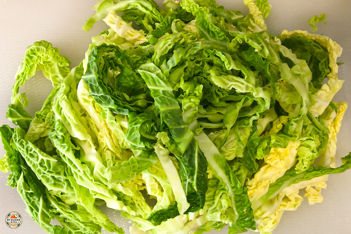 Fresh cabbage sliced and ready to make keto fried cabbage, simple low carb recipe preparation.