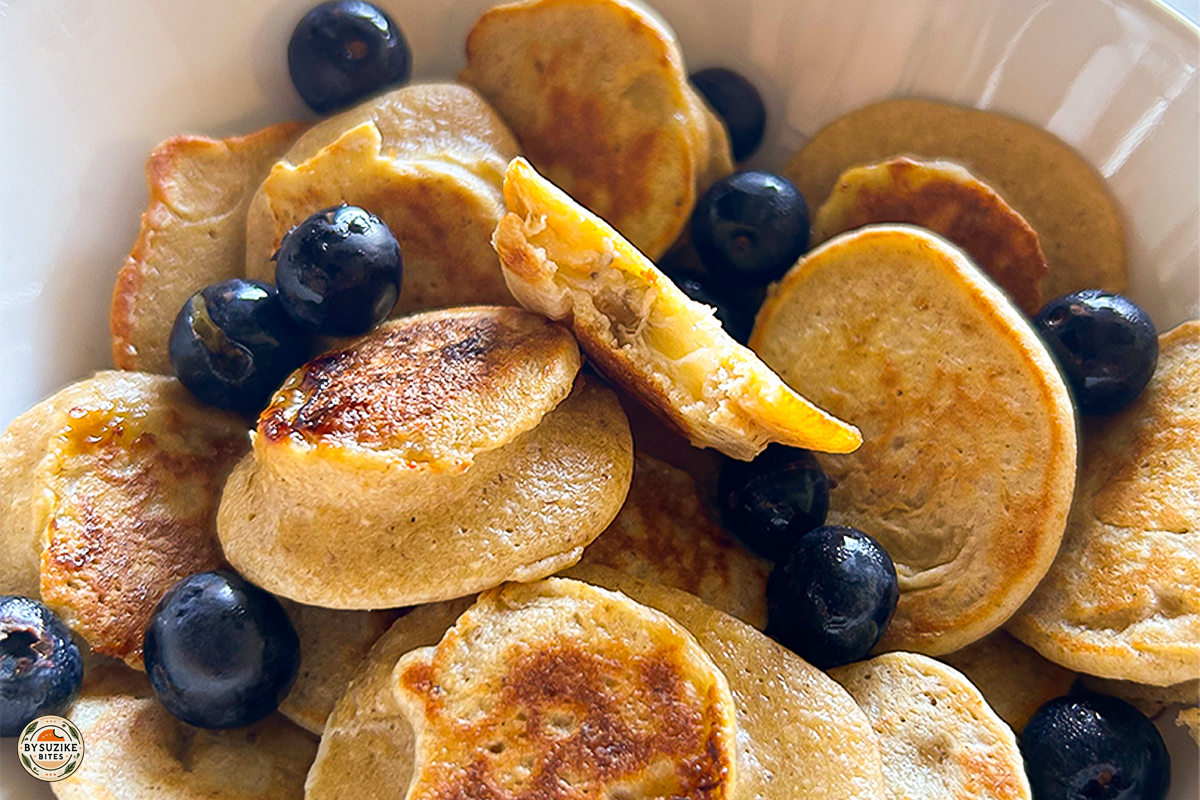 Close up of mini oat and banana pancakes with blueberries