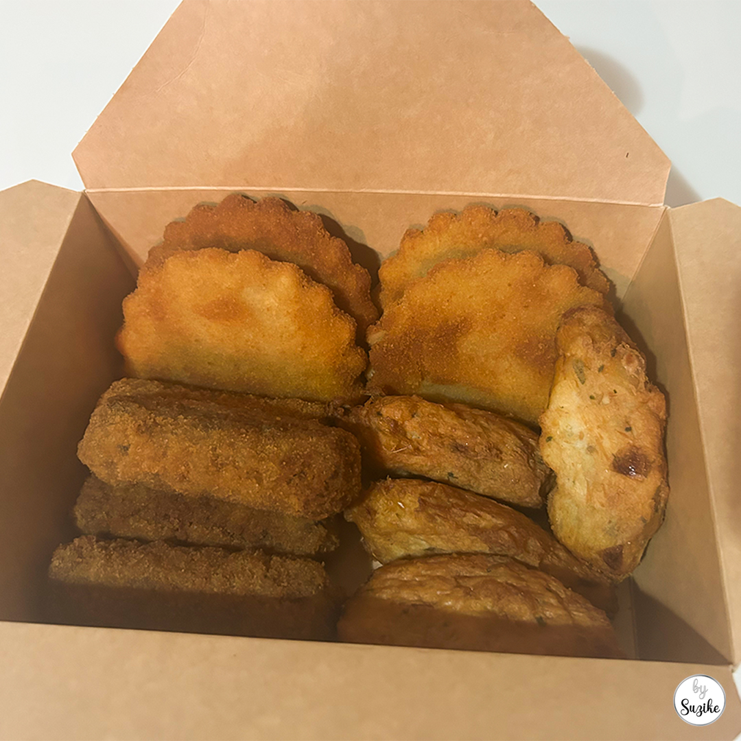 Pingo Doce Christmas dinner review Portugal, salgados box opened showing the assortment inside.