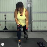 Upper body kettlebell workout at home with a woman training using kettlebells and dumbbells during a 3 round strength session.