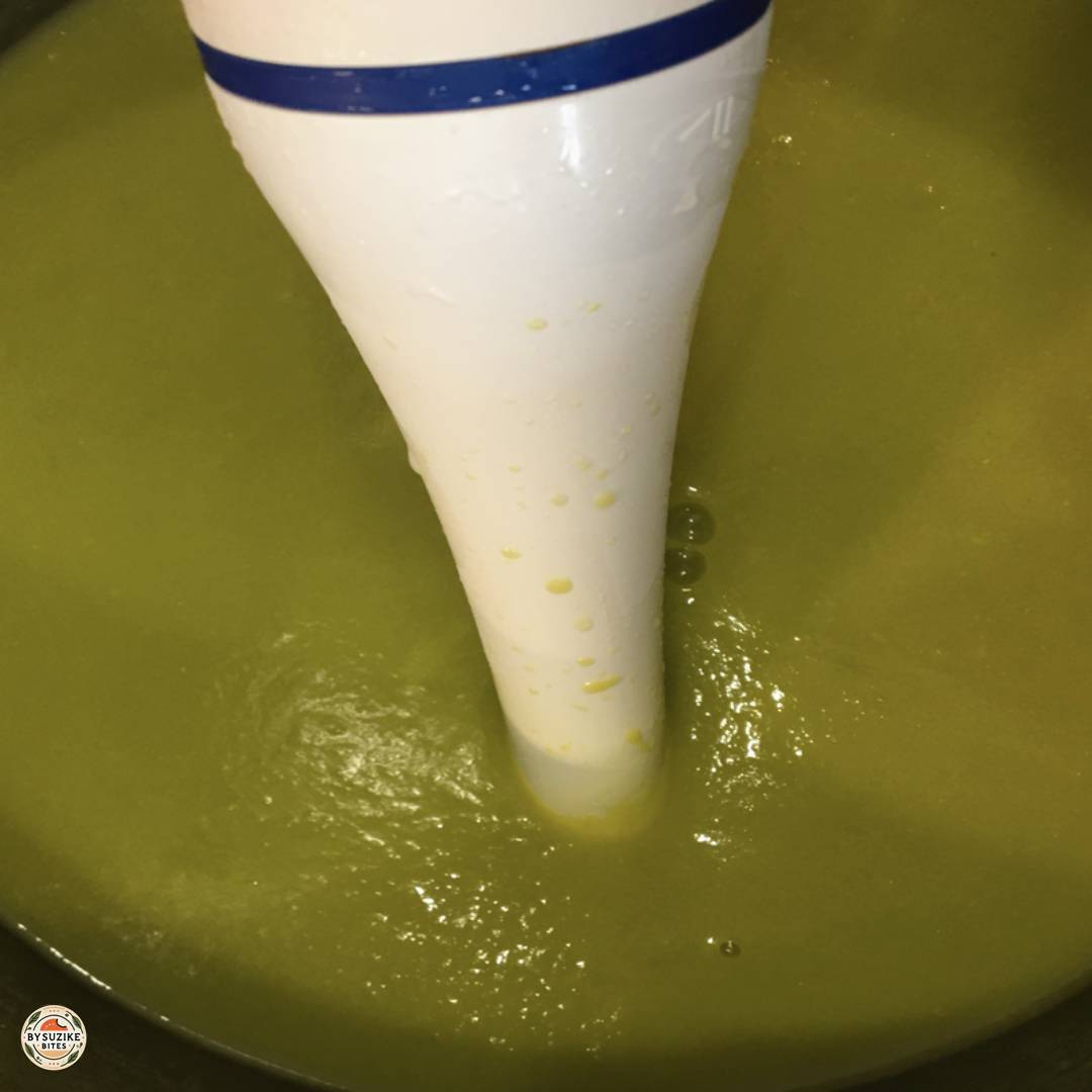 Smooth blended pea soup texture in the pot.