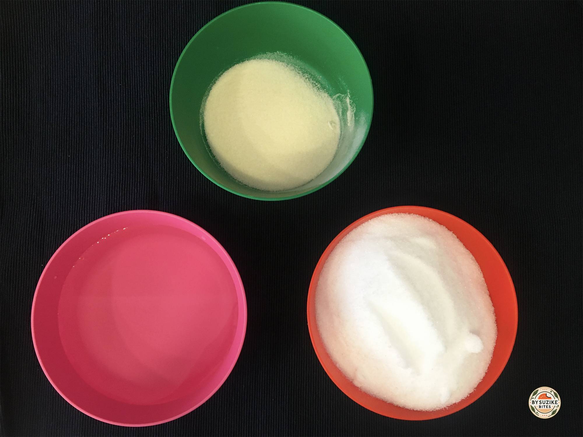 Bowls with water, gelatin powder, and erythritol for keto marshmallows.