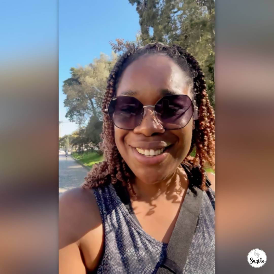 YouTube thumbnail showing a smiling woman outdoors in sunny weather wearing sunglasses, with blurred sidebars and the text “RUNNING JOURNEY DAY 2.”