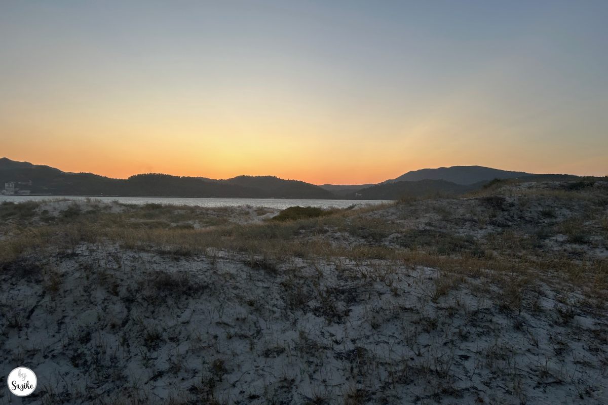 relaxing-vacation-troia-portugal-beach-09 Sunset over the dunes and water during a relaxing vacation in Troia Portugal