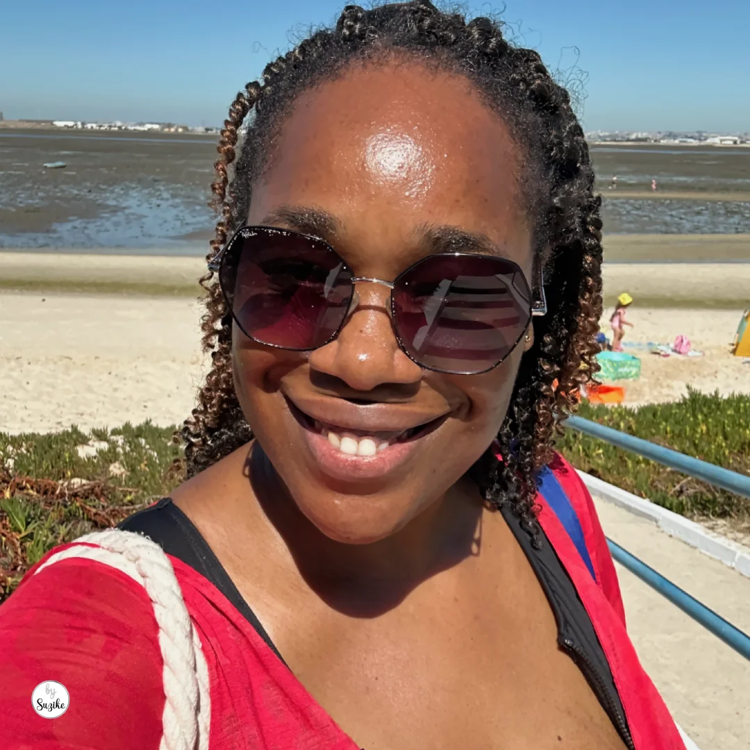 Woman smiling in sunglasses during a family morning at Praia Fluvial do Rosário.