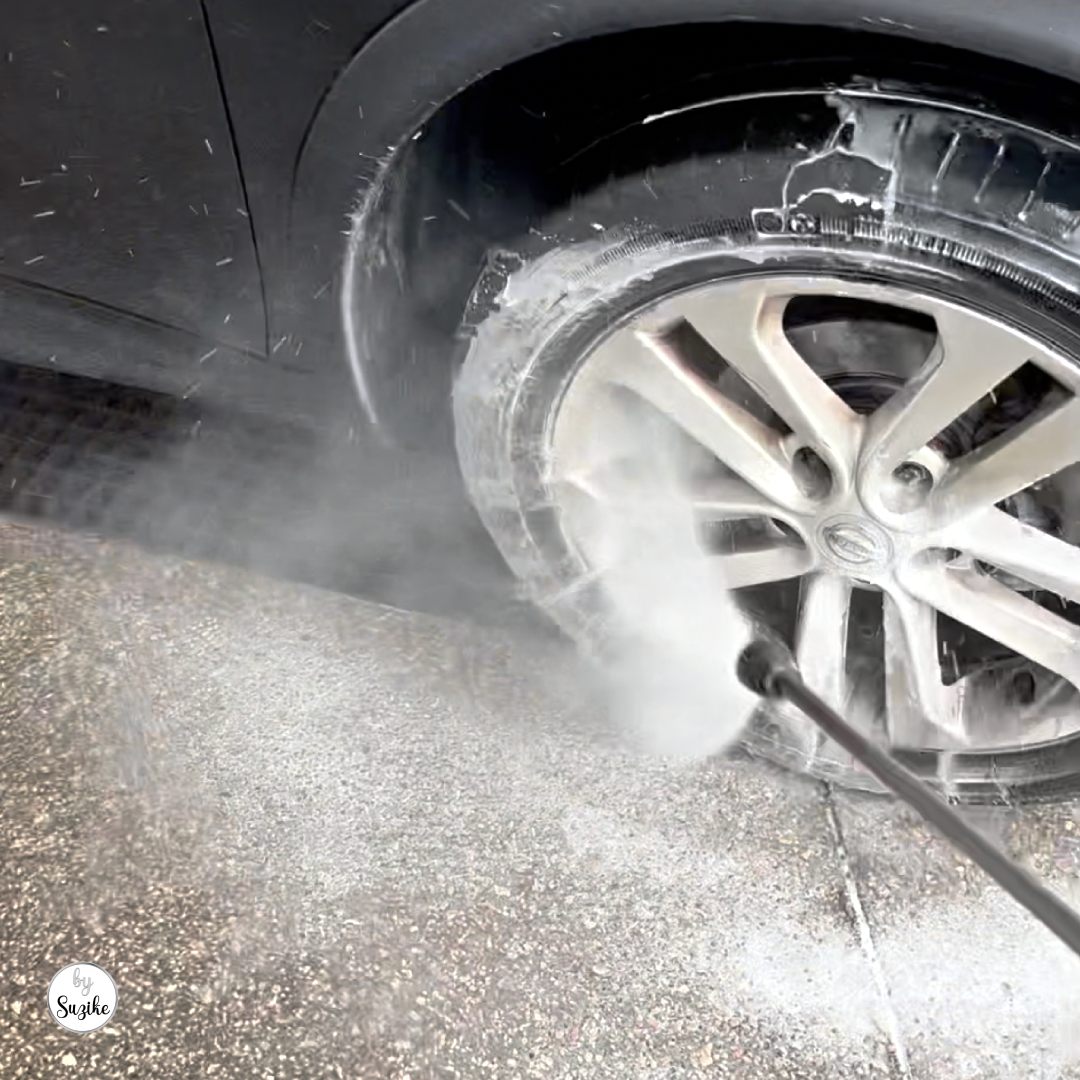 Using the pressure washer during the pre-wash stage at a self-service car wash