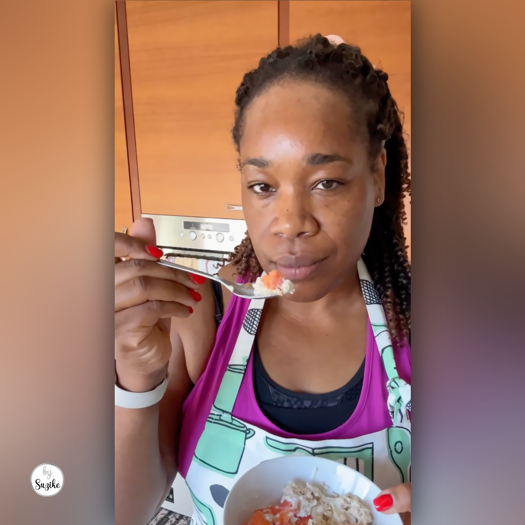 Woman holding a breakfast bowl during a simple morning routine at home