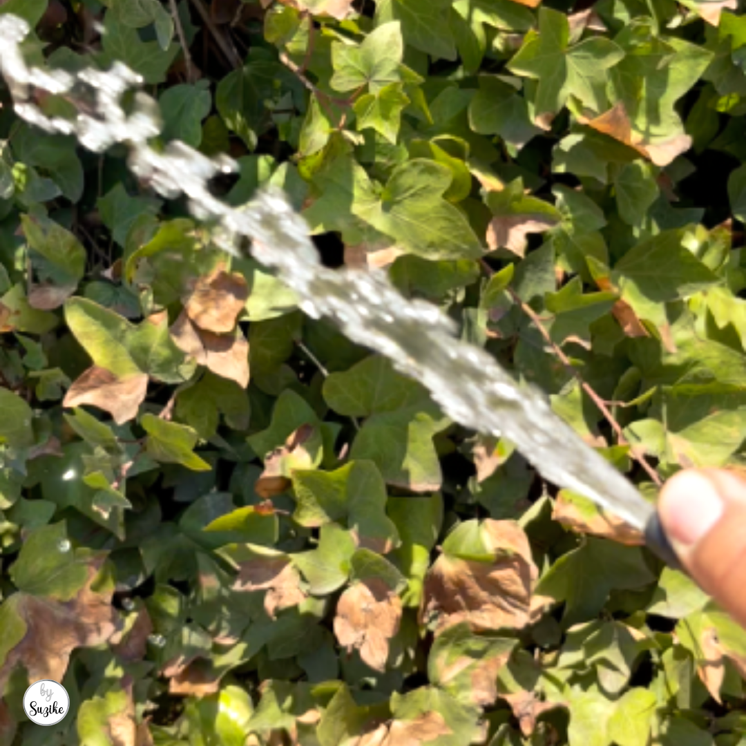 washing-hands-after-checking-tire-pressure-portugal Water running from an outdoor tap after checking tire pressure in Portugal